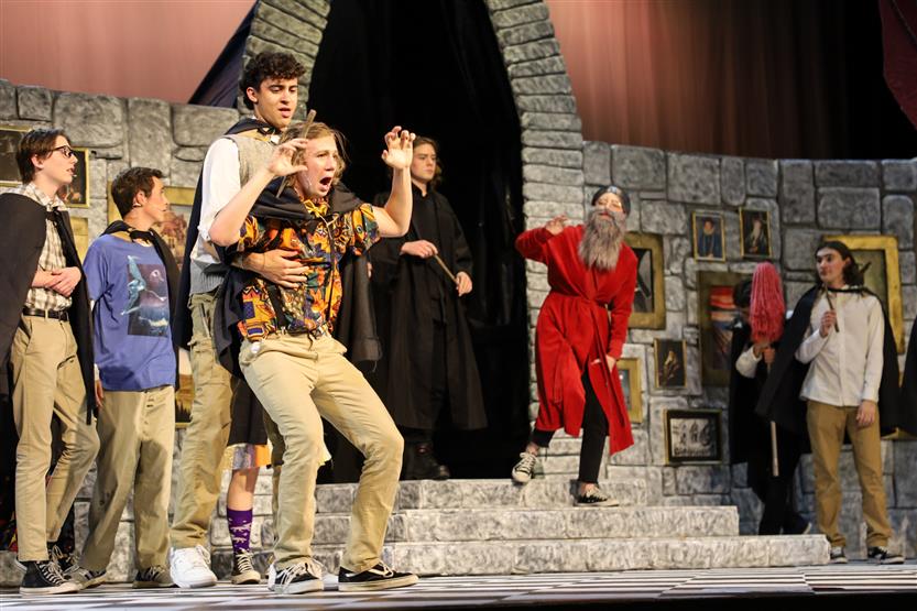 Students perform onstage
